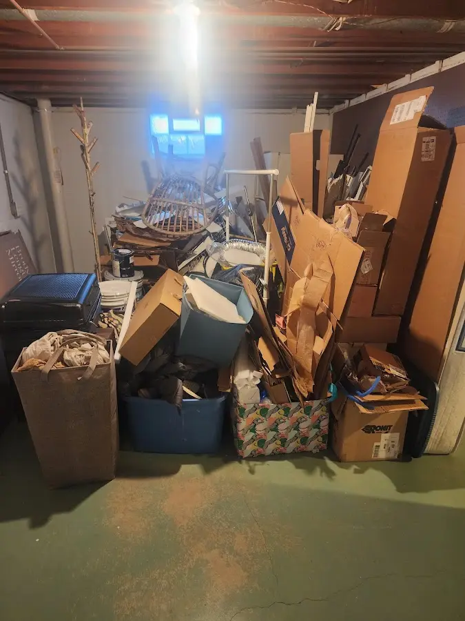 Roll-off dumpster container at job site for 8 Yard Dumpster Rental in Mena